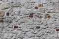 Old grey stone wall background texture close up. Krakow, Poland Royalty Free Stock Photo