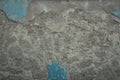 Old grey stone wall with blue paint texture background. Cracked aged dark surface Royalty Free Stock Photo