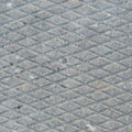 Old grey weathered concrete plate, rough grunge abstract cement tile texture diagonal groove pattern macro closeup, diagonally