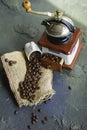 Old grinder and coffee beans dark background Royalty Free Stock Photo