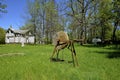 Old grindstone on the grass Royalty Free Stock Photo