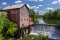 Old Grist Mill with Water Wheel and Dam Royalty Free Stock Photo
