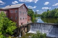 Old Grist Mill with Water Wheel and Dam Royalty Free Stock Photo