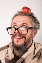Old grumpy man with beard and big nerd glasses Royalty Free Stock Photo