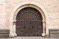 Old grunge arch wooden door