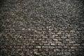 Old grunge cobble stone road surface background texture Royalty Free Stock Photo