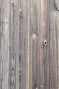 Old grunge dark brown wood panel pattern with beautiful abstract grain surface texture, vertical striped background or backdrop in Royalty Free Stock Photo