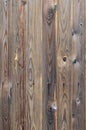 Old grunge dark brown wood panel pattern with beautiful abstract grain surface texture, vertical striped background or backdrop i Royalty Free Stock Photo