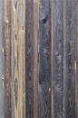 Old grunge dark brown wood panel pattern with beautiful abstract grain surface texture, vertical striped background or backdrop i Royalty Free Stock Photo