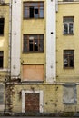 Old grunge deserted house with broken-out windows Royalty Free Stock Photo