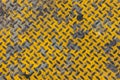 old grunge dirty steel pavement anti slip ground floor yellow color in heavy industry texture pattern for background Royalty Free Stock Photo