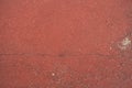 Old red grunge floor of cement and stone, rough texture background Royalty Free Stock Photo