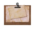 Old grunge papers close-up on brown clipboard Royalty Free Stock Photo