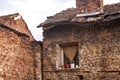 Old grunge weathered house brick wall backside facade