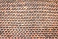Old grunge red and orange weathered roof tiles texture background. Royalty Free Stock Photo