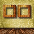 Old grunge room with wooden picture frames Royalty Free Stock Photo