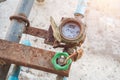 Old grunge rusted typical residential water meter.