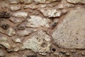 Old grunge stone wall texture, material, pattern wallpaper and background, close up. Natural contrast masonry rock wall granite. Royalty Free Stock Photo