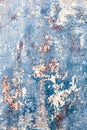 Old grunge wall of an old house with remainings of color Royalty Free Stock Photo