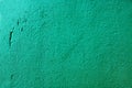 Old grunge wall painted with green dye Royalty Free Stock Photo