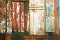 Old grunge and weathered red, white and green wooden wall planks texture background Royalty Free Stock Photo