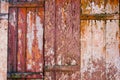 Old grunge and weathered red, yellow and white wooden wall planks texture background Royalty Free Stock Photo