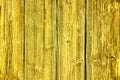 Old grunge and weathered yellow wooden wall planks texture background Royalty Free Stock Photo