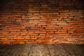 Old grunge wood foreground with old brick wall Royalty Free Stock Photo
