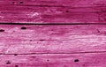 Old grunge wooden fence pattern in pink tone Royalty Free Stock Photo