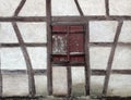 Old grunge wooden shutter window on a french rural house Royalty Free Stock Photo
