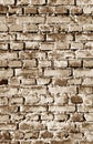 Old grungy brick wall surface in brown tone Royalty Free Stock Photo