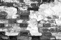 Old grungy brick wall texture in black and white Royalty Free Stock Photo