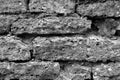 Old grungy brick wall texture in black and white Royalty Free Stock Photo
