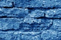 Old grungy brick wall texture in navy blue tone Royalty Free Stock Photo