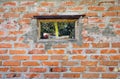 Old grungy brick wall texture. Vintage wall with window Royalty Free Stock Photo