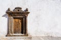 Old grungy church portal in a street of the Marvao village