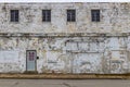 Old, grungy industrial building in a rust belt community. Old buildings in former auto factory towns are becoming run down and Royalty Free Stock Photo