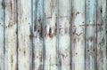 Old grungy and weathered white grey and blue painted wooden wall plank texture background weathered by long exposure Royalty Free Stock Photo