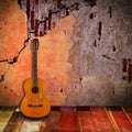 Old guitar with vintage room Royalty Free Stock Photo