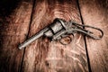 Old gun on wooden table Royalty Free Stock Photo