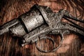 Old gun on wooden table Royalty Free Stock Photo