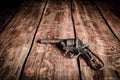 Old gun on wooden table Royalty Free Stock Photo