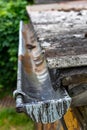 An old gutter in a detached house. Rainwater drainage from the roof Royalty Free Stock Photo