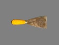 old gyan putty or spatula isolated on gray background, handtools for construction, look old and dirty. Royalty Free Stock Photo