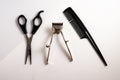 Old hair clippers on a white background with scissors and comb ,top view , copy space Royalty Free Stock Photo