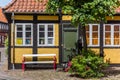 Old half timbered house with bench in Ribe Royalty Free Stock Photo