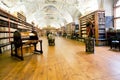 Old hall with books in an ancient monastery Royalty Free Stock Photo