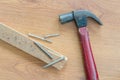 Old hammer nails and wood on table Royalty Free Stock Photo