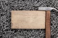 Old hammer nails and wooden board Royalty Free Stock Photo