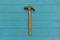 Old hammer on wood texture background Royalty Free Stock Photo